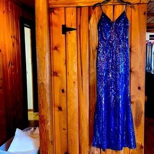 Gorgeous blue prom dress with rose gold accents.